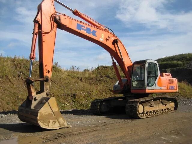 Экскаватор фиат. Kobelco e385. Фиат Кобелко экскаватор. Гусеничный экскаватор Фиат Кобелко 385. Экскаватор Fiat Kobelco ex125w.