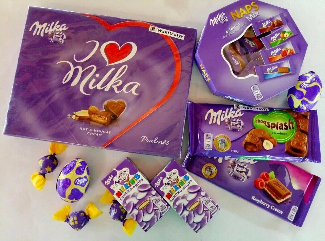 Milka jelly. Милка карамель конфеты. Milka коробка конфет. Милка конфеты в коробке. Милка шоколад в коробке.