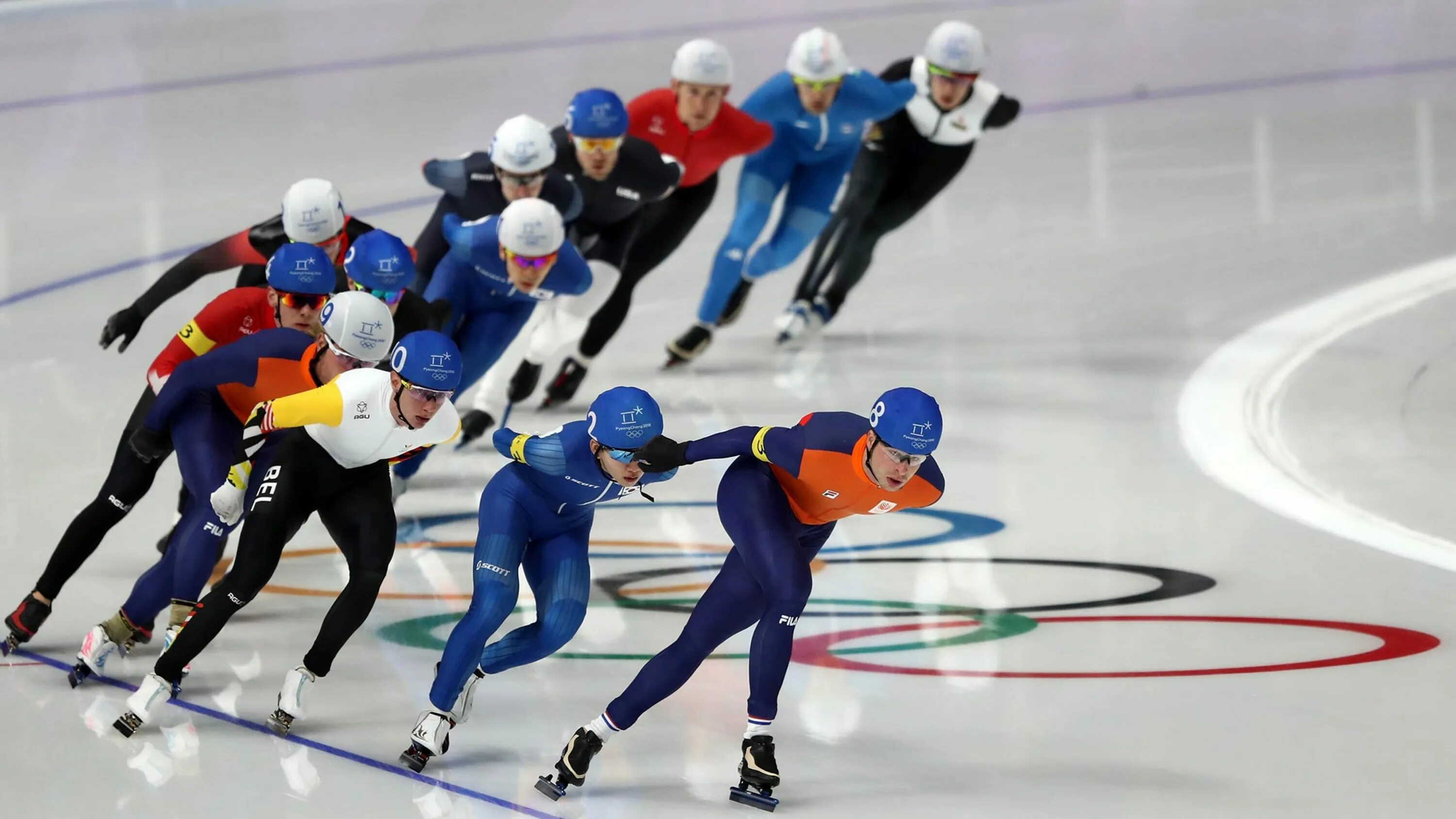 Конькобежный спорт Олимпийские игры. Speed Skating конькобежный спорт. Конькобежный спорт Олимпийский вид спорта. Зимние игры конькобежный спорт. История игр соревнований