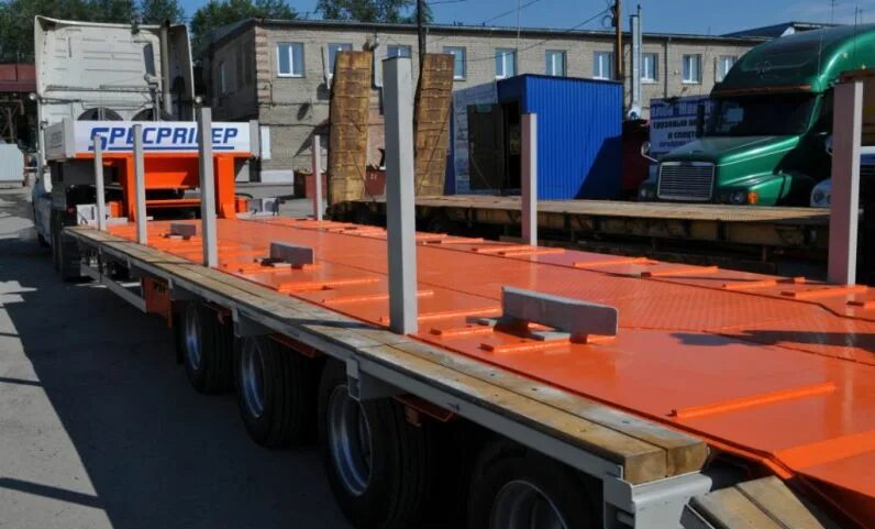 Novus trailer. 52 тонны. полуприцеп rockson 989140. полуприцеп-тяжеловоз 9942m5. 52 тонны.