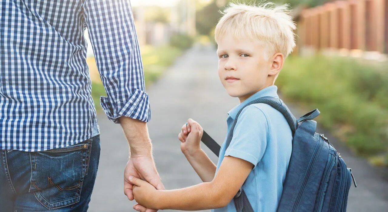 Включи папе 5. A father hold his son hand back view.