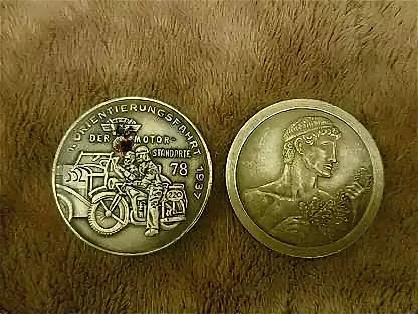 Жетоны Нюрнберг. Жетон SS verfungustrulle. Немецкий жетон gemeldet. Медальон немецкие два профиля.
