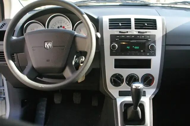 2006 dodge caliber interior - механика. Додж калибер черный матовый. Dodge caliber 2007 салон. Dodge caliber 1. Додж механика.