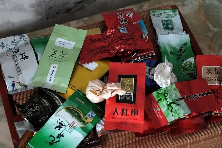 Китайский чай в пакетиках. Китайский чай в зеленой упаковке. Китайский чай в маленьких пакетиках. Китайский чай в зеленых пакетиках.