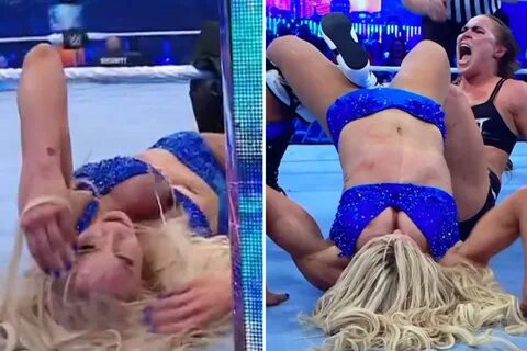 WWE forced to switch live TV to black after Charlotte Flair suffers wardrob...