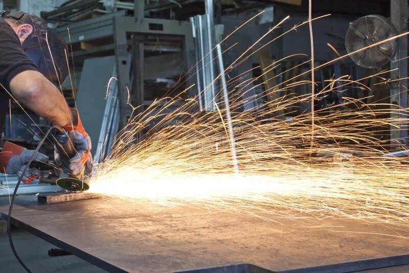 Metal grinder. Grinding wheel frame. Disk grinder. Grinding wheel. Metal grinder.