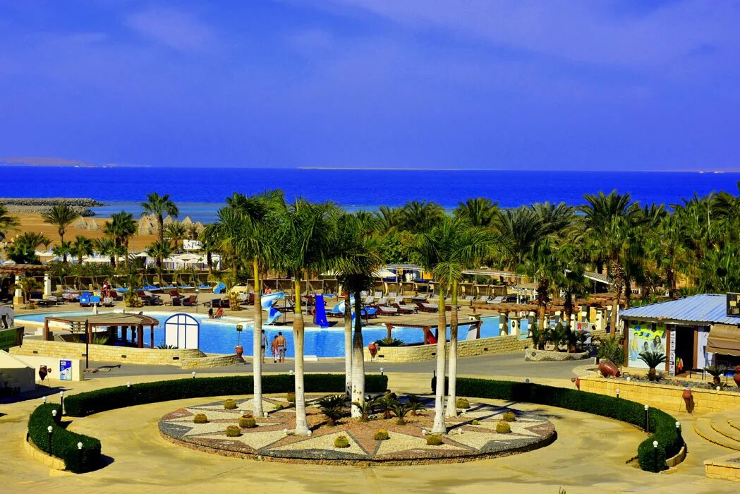 Coral beach hotel resort. Coral Beach Hotel Resort 5 Хургада. Coral Beach Hotel Hurghada Египет Хургада. Отель Корал Бич Хургада Египет. Coral Beach Resort 4 Хургада.