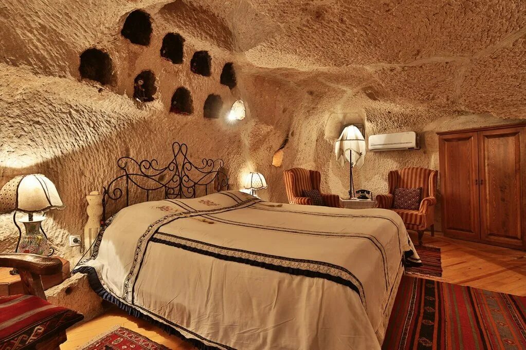 Aza cave. Отель Гореме Каппадокия. Отель в пещере в Каппадокии. Отель в скале Турция Каппадокия. Cave House Каппадокия.