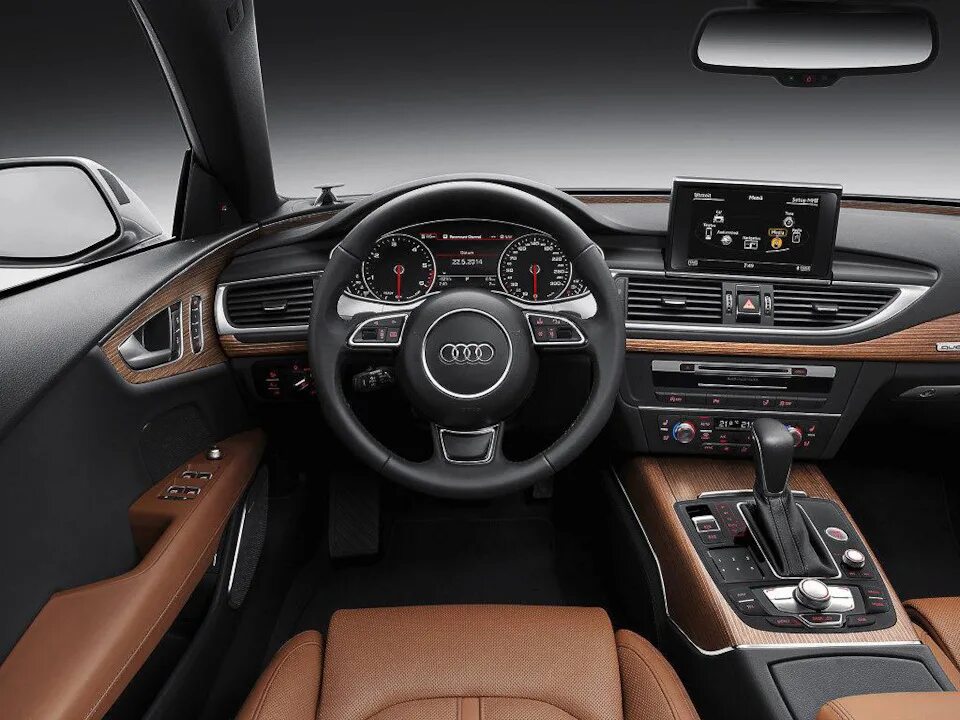 Обзор ауди с7. Audi a7 2015. Audi rs7 sportback 2022. Audi а7 спортбэк. Audi a7 2014 салон.