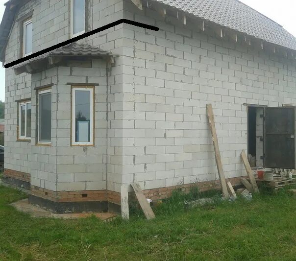 полукруглый эркер из газобетона. овальный дом из блоков. дом из газоблоков с эркером. кладка эркера. эркер из газобетона.