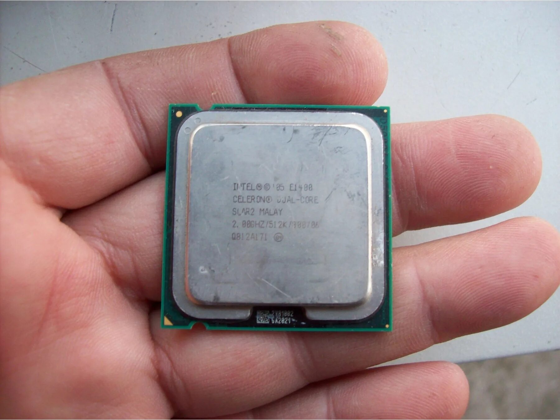 Процессор Intel e1400 Celeron Dual-Core slar2 Malay. Celeron Dual Core e1400. Интел 0.2 Celeron Malay. Intel Celeron Dual Core e1400.