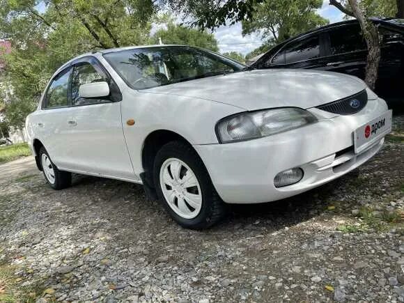 Мазда -фамилия - 1998 г.в. Mazda familia 1998 1.5 МКПП. Mazda familia, 1998 салон. Мазда фамилия 1997. Купить мазда уссурийск