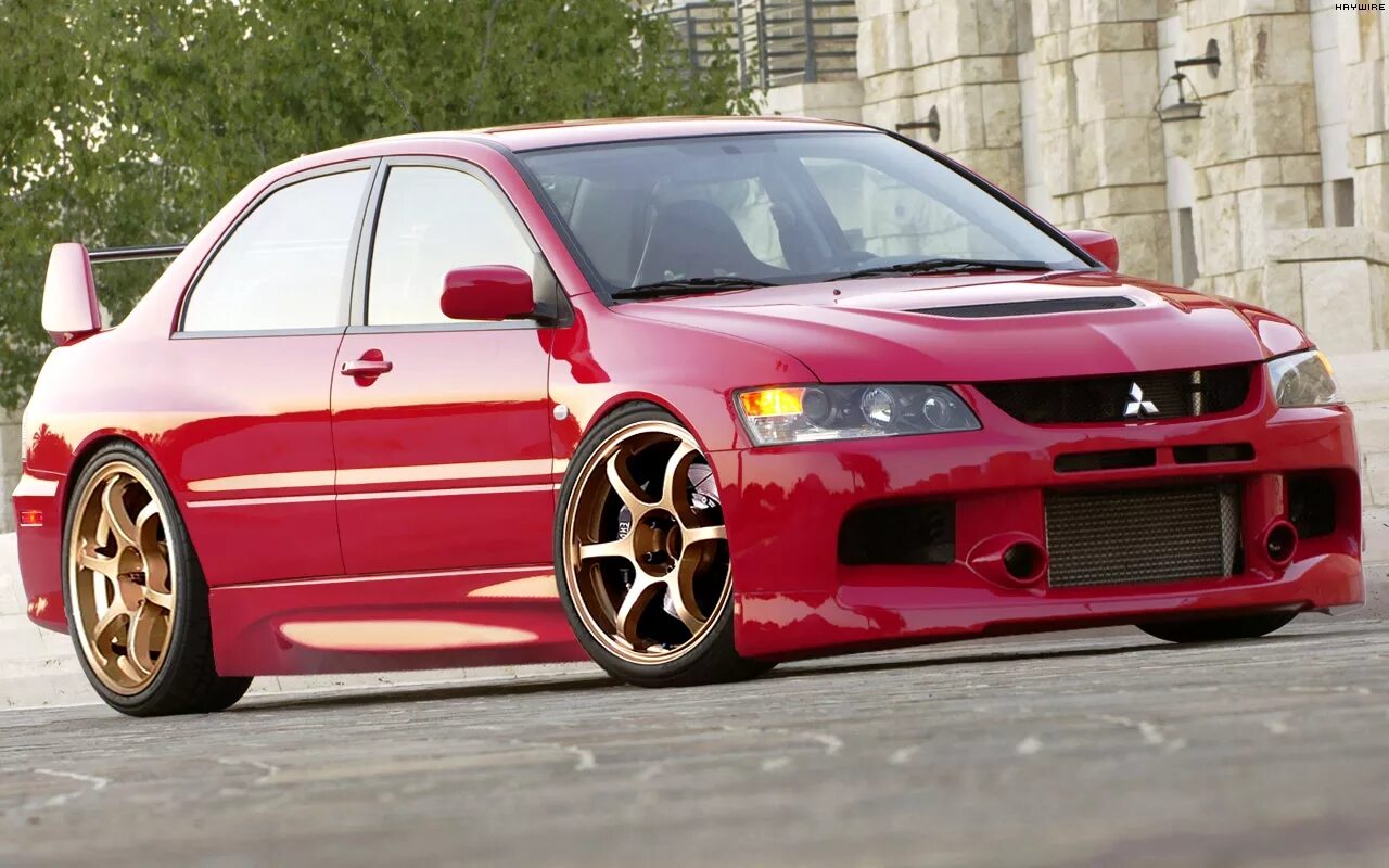 Эва митсубиси. Mitsubishi Lancer EVO IX. Митсубиси Лансер Эволюшн 2006. Митсубиши Лансер 9 Эво. Mitsubishi Lancer and Lancer Evolution 9.