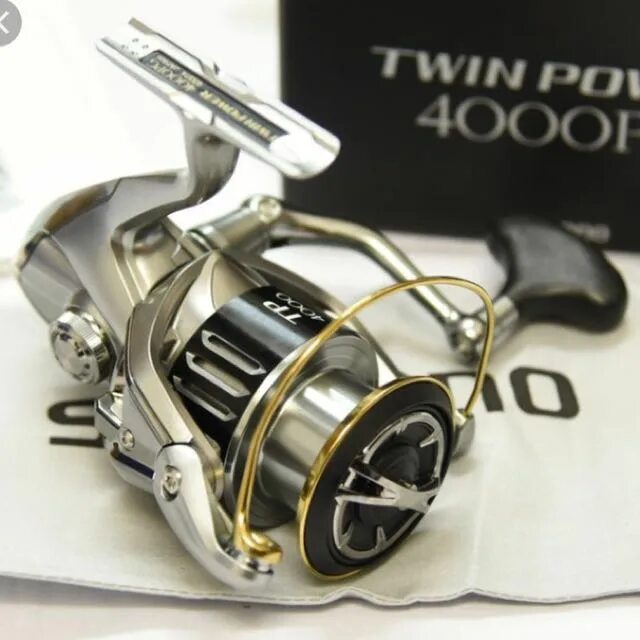 Катушка шимано твин пауэр 4000 pg. Shimano twin power 15 4000pg. Shimano twin power 15 4000pg. Shimano twin power 15 4000pg. Shimano twin power 4000pg 15.