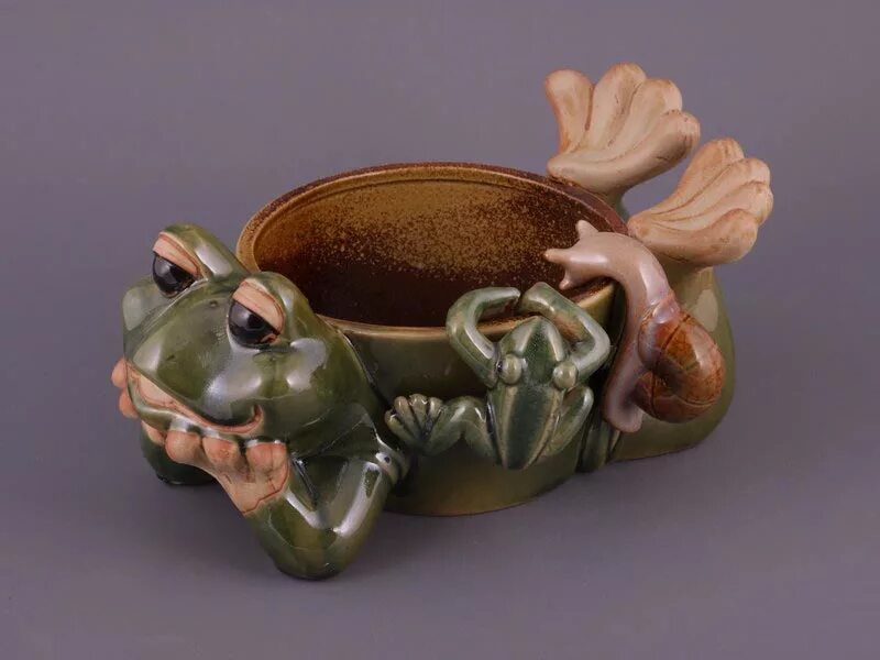 Скопинская керамика лягушка. Скопинская керамика жаба. Скопинская керамика квасник. Скопинская керамика Лев.