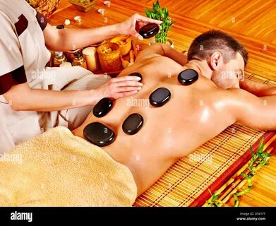 RFD561FT–Man. getting stone therapy massage in spa. 
