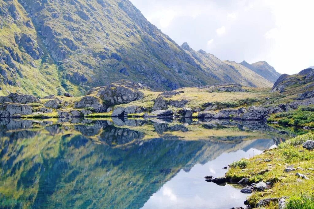 озеро байкал наследие юнеско. озеро араданское саяны. всемирного наследия юнеско гора. эрэнхай байкал гора. памятники культурного наследия юнеско в россии горы.