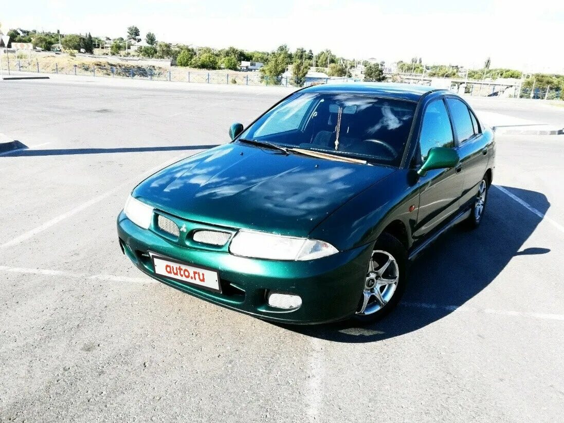 Mitsubishi carisma 1.6. Мицубиси Каризма 1998. Митсубиси Каризма 1998 1.6. Митсубиси Carisma 1998. Машина Mitsubishi Carisma зелёные.