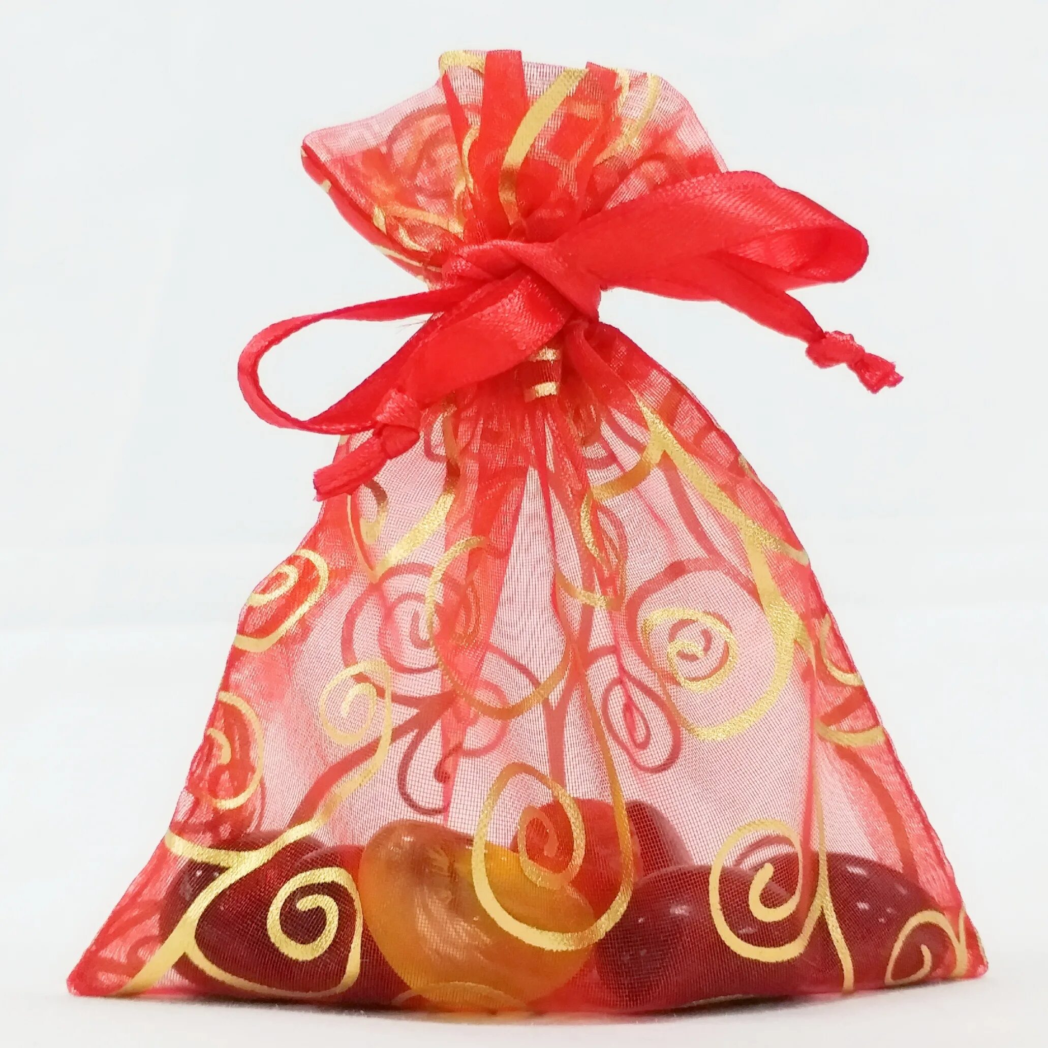 новогодняя упаковка для конфет. сладкий новогодний подарок в пакете. конфеты в прозрачном мешочке. сладкие новогодние подарки в мешочках. новогодний мешок с конфетами.