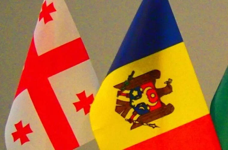Молдавия грузия. Украины, Грузии и Молдавии и ЕС. Флаг Украины и Грузии. Флаги Грузии и Молдавии. Грузия и Россия.