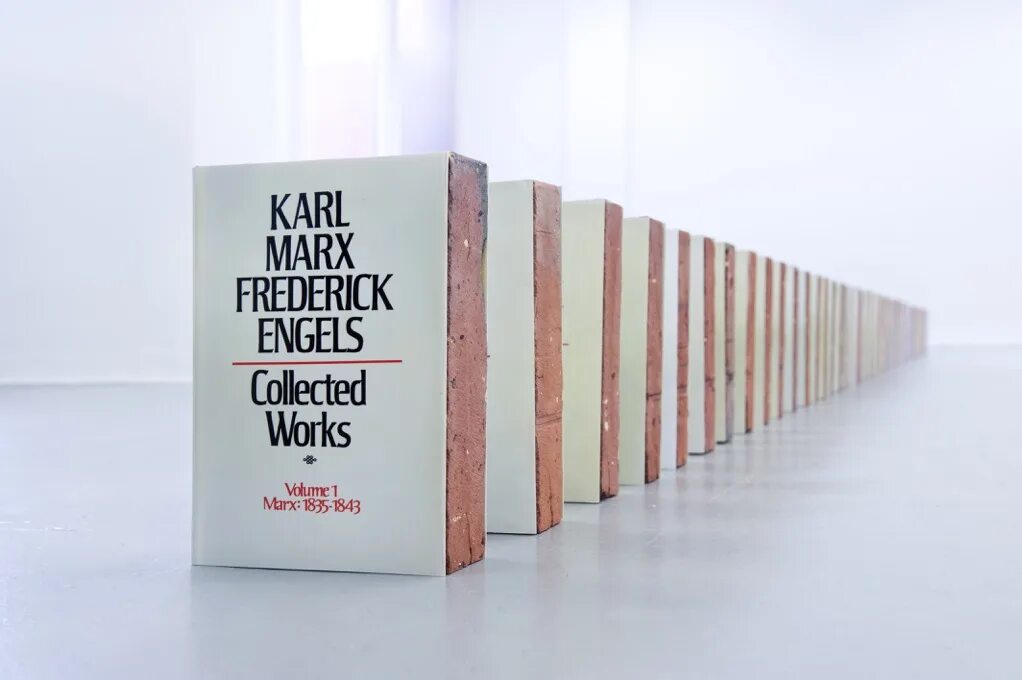 Fredrick Engels. Frederick Engels on the book. Marx and Engels book about Family. Frederick Engels Bust.