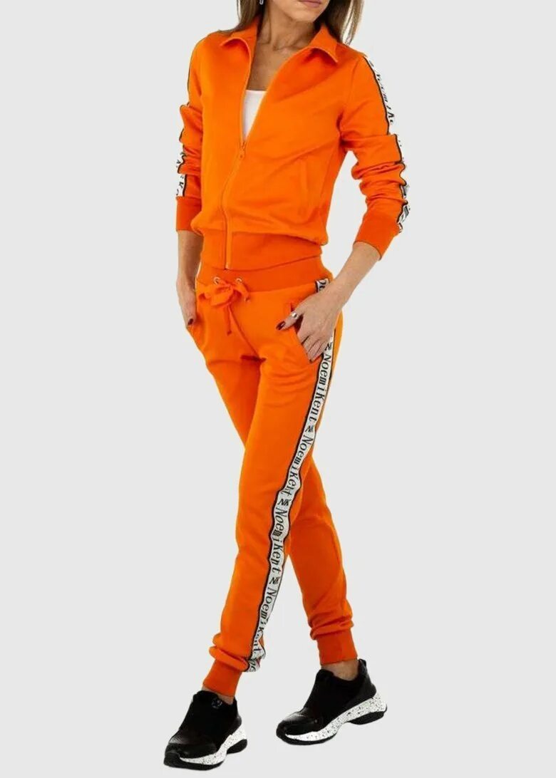 Оранжевый спортивный костюм. Оранжевый спортивный костюм женский. Ярко оранжевый костюм. Ярко оранжевый спортивный костюм.