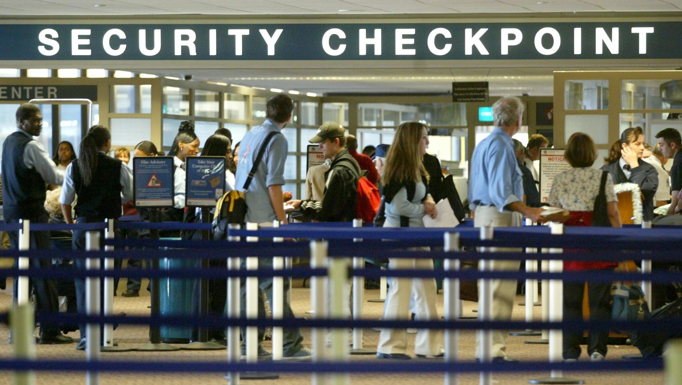 Check in point. Airport security checkpoint. security check sign airport. security check at the airport thz. security check in area.