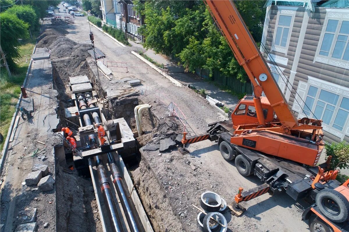 Ремонт теплотрассы. Трубы теплотрассы. Ремонт теплосетей. Ремонт тепловых сетей. Теплотрасса.