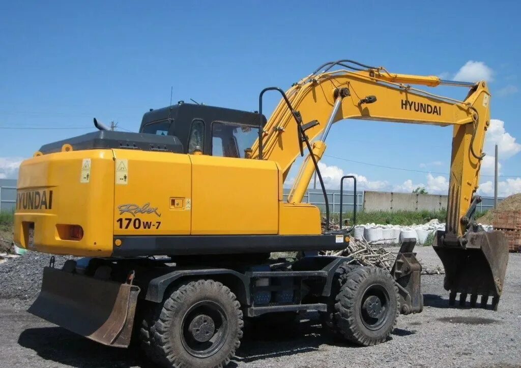 Hyundai r170w-7. Колесный экскаватор Hyundai r170w-7. Экскаватор колесный Hyundai 170 w7. Колесный полноповоротный экскаватор Hyundai 170.