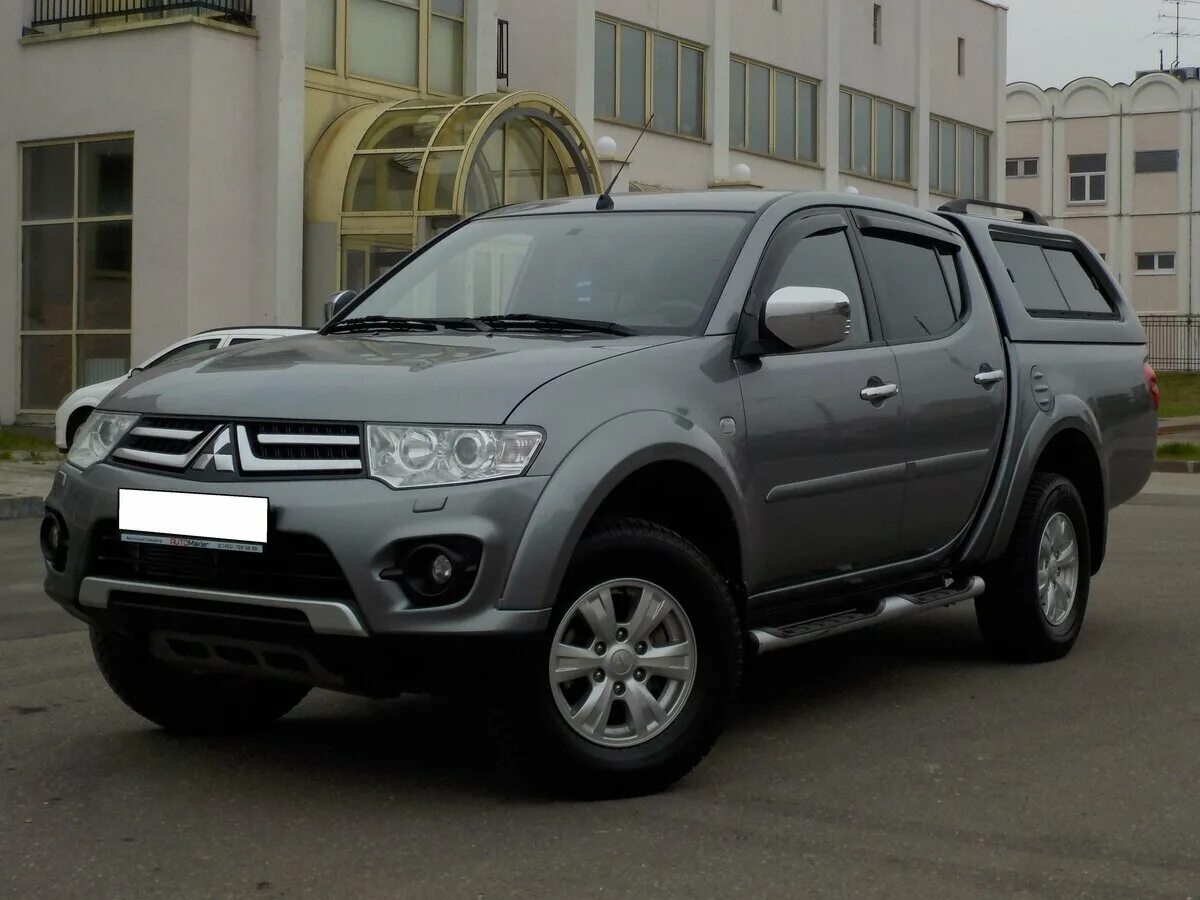 Митсубиси л200 2013. Мицубиси l200 2.5 2013. Mitsubishi l200 2013 года. Митсубиси л200 2.