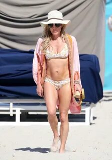 Braunwyn Windham-Burke in Bikini on the beach in Miami. 
