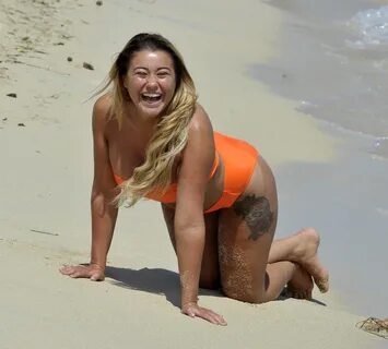 Fat blonde Ellie Young showing her ginormous ass and tree-like legs gallery...