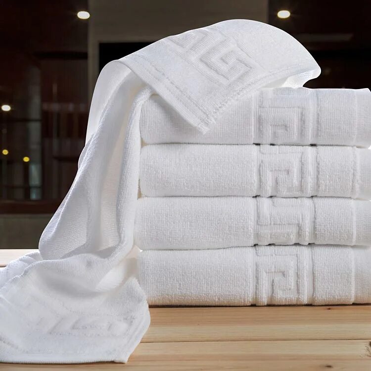 White полотенца. Полотенце махровое. Полотенца для гостиниц. Белое полотенце. Полотенца в интерьере.