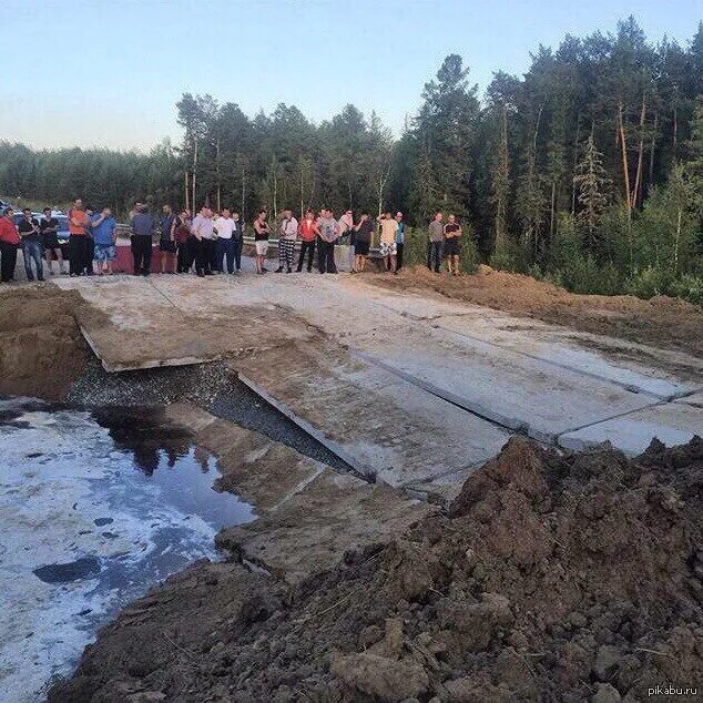 Дорога Тюмень Ханты-Мансийск. Трасса Тюмень Ханты-Мансийск размыло. Река Нюрым. Размыло дорогу в Салыме.