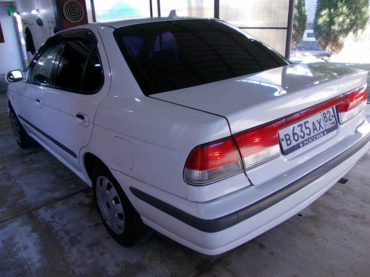 Ниссан санни край. Nissan Sunny b15. Ниссан Санни b15. Ниссан Санни в15 белый. Кузов Ниссан Санни b15.