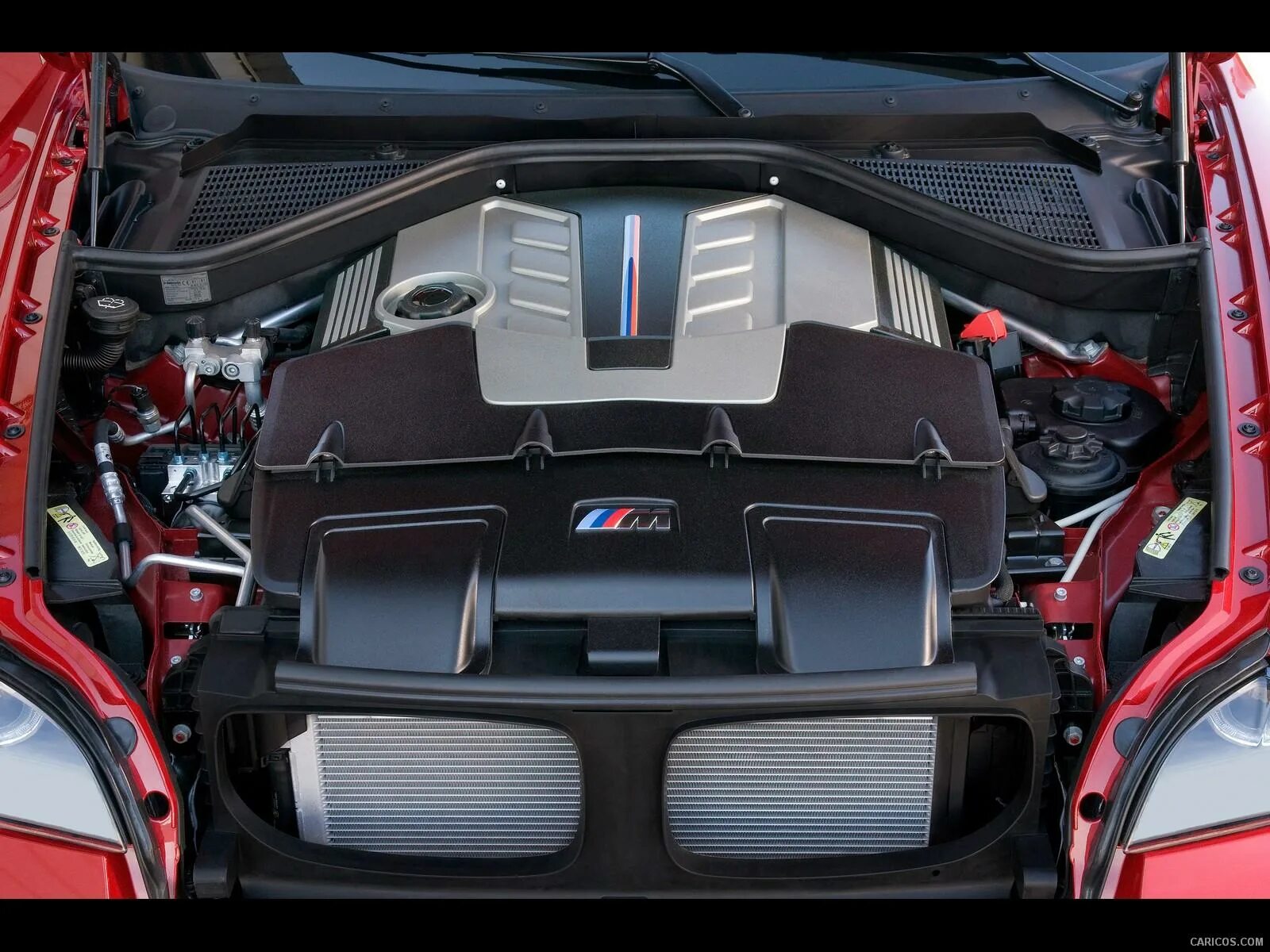 Bmw m 2010. Двигатель бмв х6м. Bmw x6 e71 двигатели. Bmw x6 2010 под капотом. Bmw x6 e71 двигатели.
