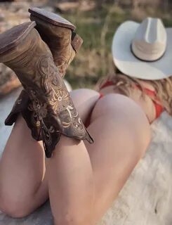 Nude in cowboy boots