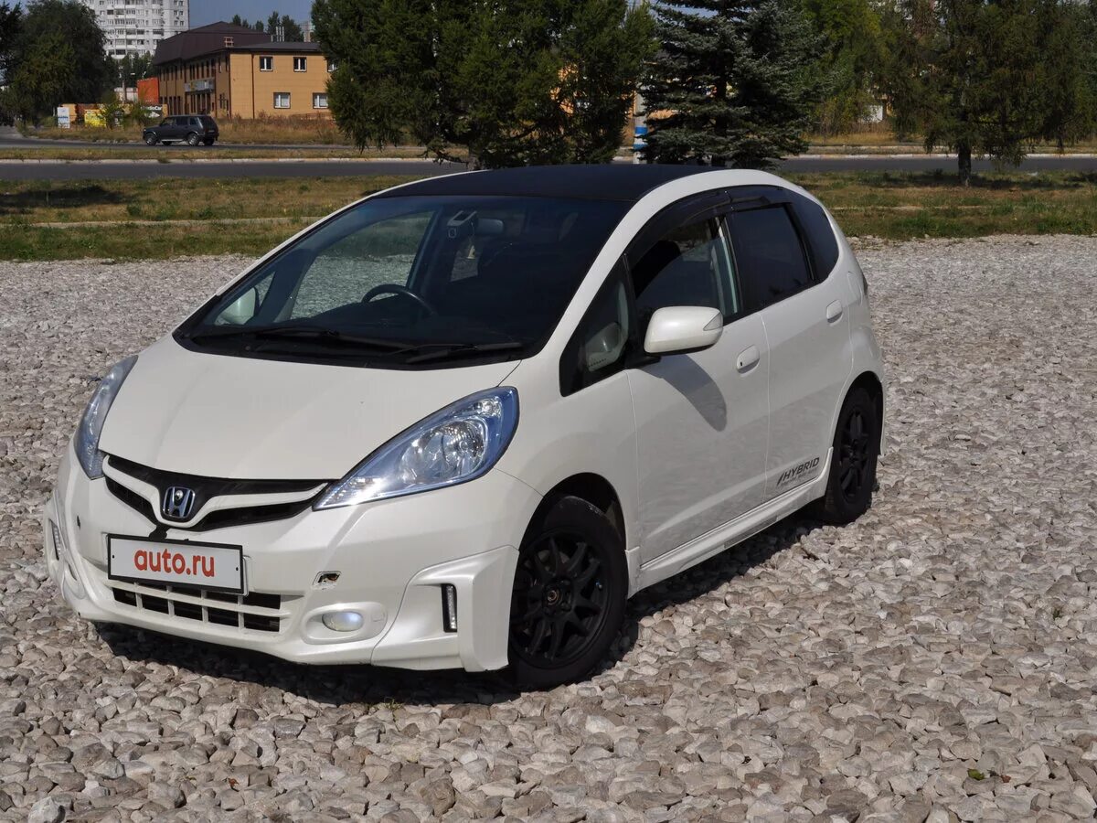 Хонда фит 2010 купить. Honda Fit 2010. Honda Fit 2010 белый. Honda Fit II 2010. Хонда фит гибрид 2010.