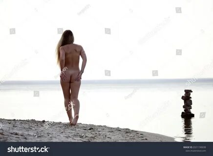 Nude Girl Walking On Beach