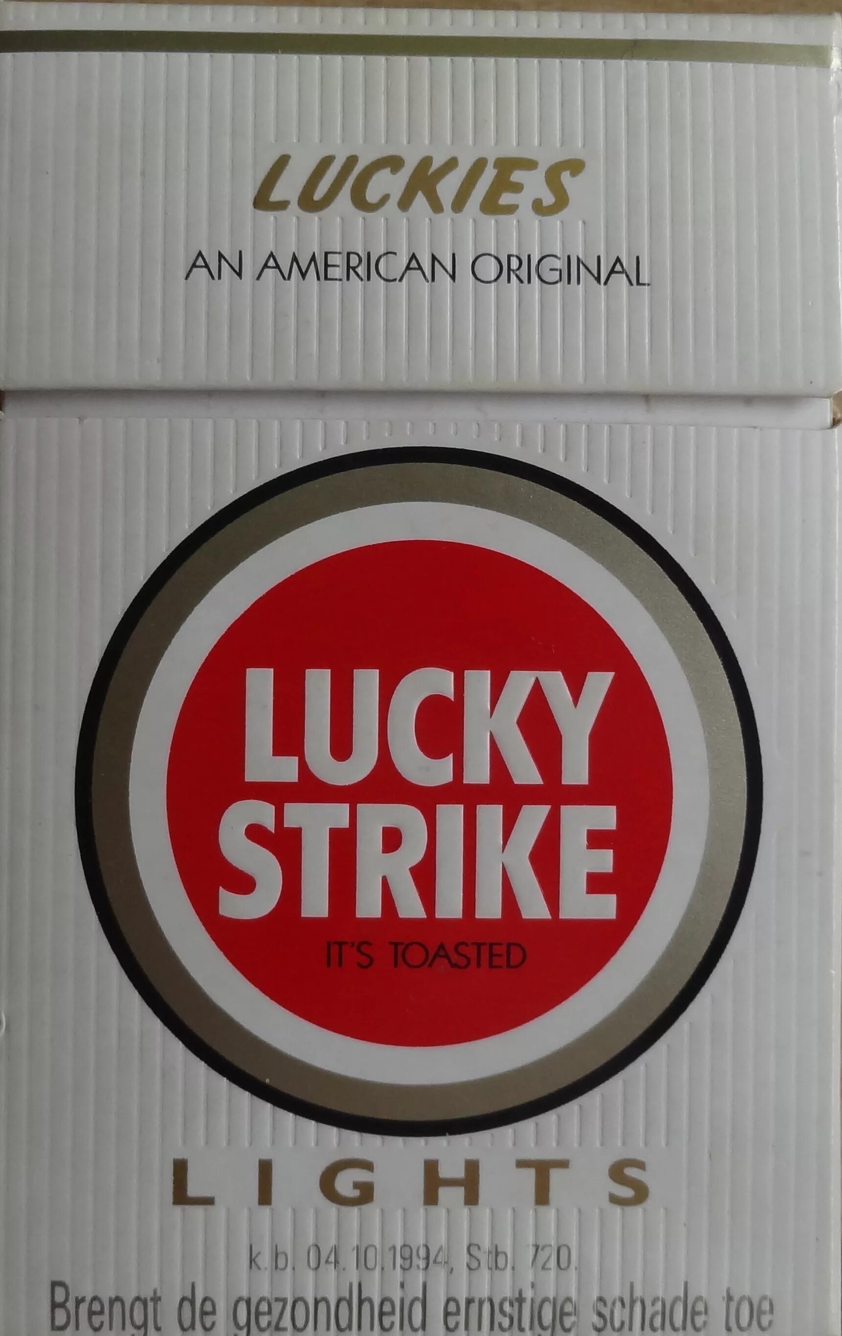 Лаки страйк с кнопкой. Сигареты Lucky Strike Compact. Лаки страйк сигареты компакт белый. Лаки страйк сигареты Вьетнам. Сигареты Lucky Strike Грин.