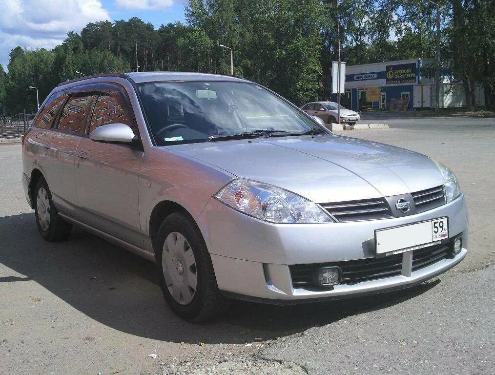 Ниссан 2003 фото. Nissan 2003. nissan вингроуд 2003. nissan wingroad 2003 silver. nissan wingroad 2003 красный.