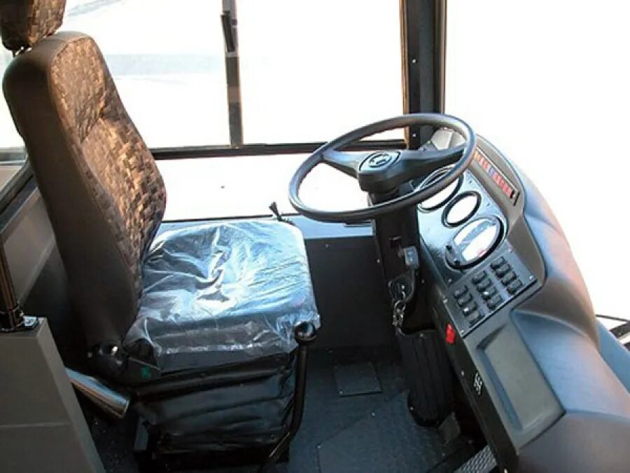 Водитель автобуса паз. ПАЗ 4230 кабина. ПАЗ 4234 кабина водителя.