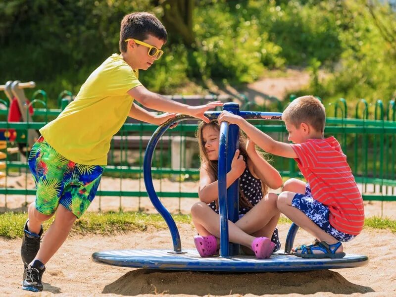The girl got stuck on the playground