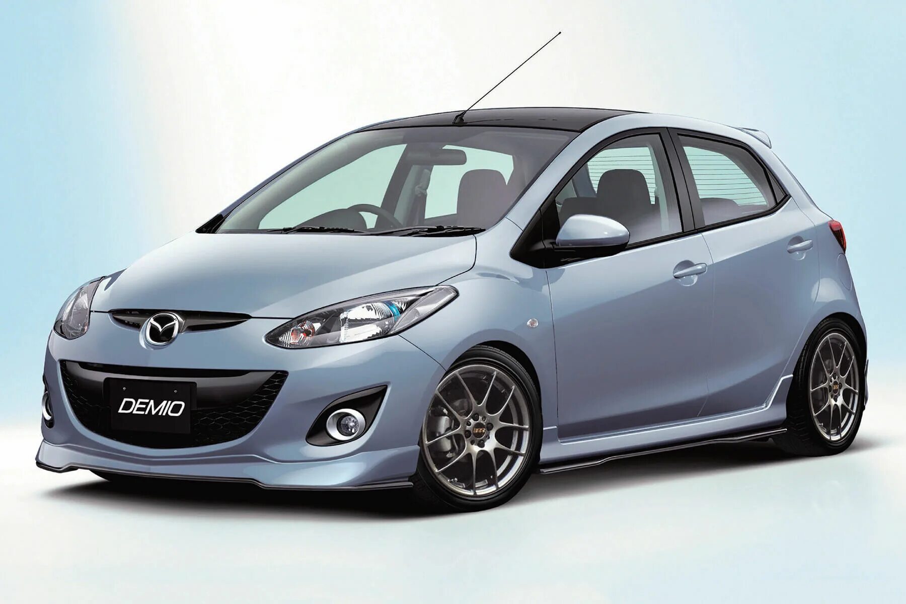 Mazda demio 2. Mazda 2 2012. Mazda Demio. Мазда Демио 2. Mazda Demio 2012.