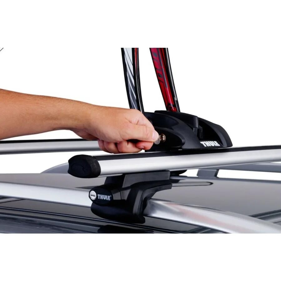 Power click. Thule OUTRIDE 561. Thule OUTRIDE Bike Rack. Багажник на крышу Thule. Велокрепление на крышу Thule.