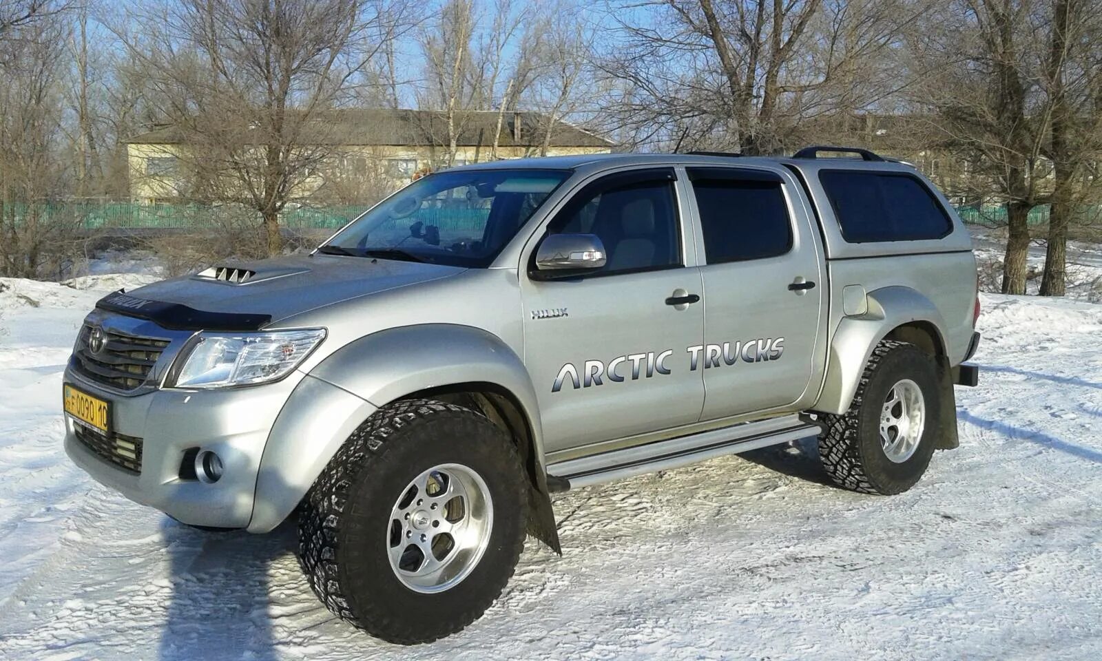 Тойота Хайлюкс 2. Тойота Хайлюкс АТ 35. Toyota Hilux 2021 Arctic Trucks с кунгом. Тойота Хайлюкс 2013 Арктик Тракс.