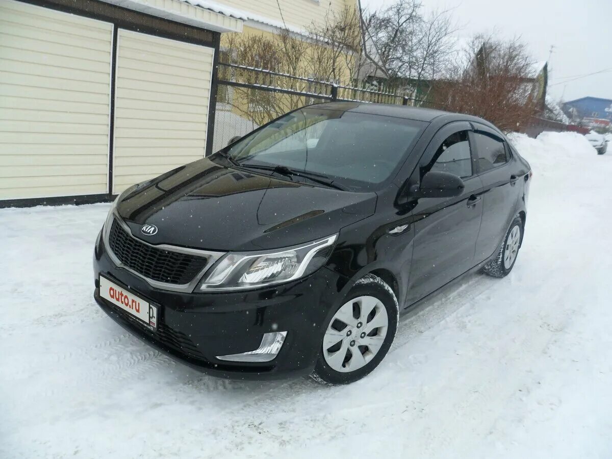 Автомобили с пробегом киа рио. Киа Рио 2014 черная. Чёрный седан Kia Rio III 1.4 at (107 л.с.). Киа Рио 3 черная. Kia Rio седан черный 2012.