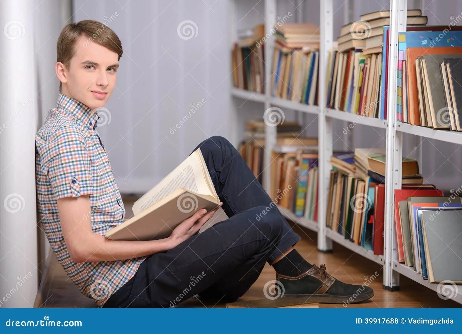 He is not reading a book