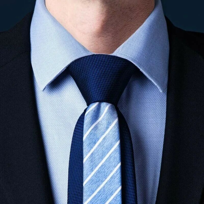 Завязываем мужской галстук видео. Узел Мюрелл галстук. Галстучный узел Тринити. Галстук полувиндзорский узел. Узел Виндзор для галстука.