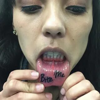 Female inner lip tattoo designs